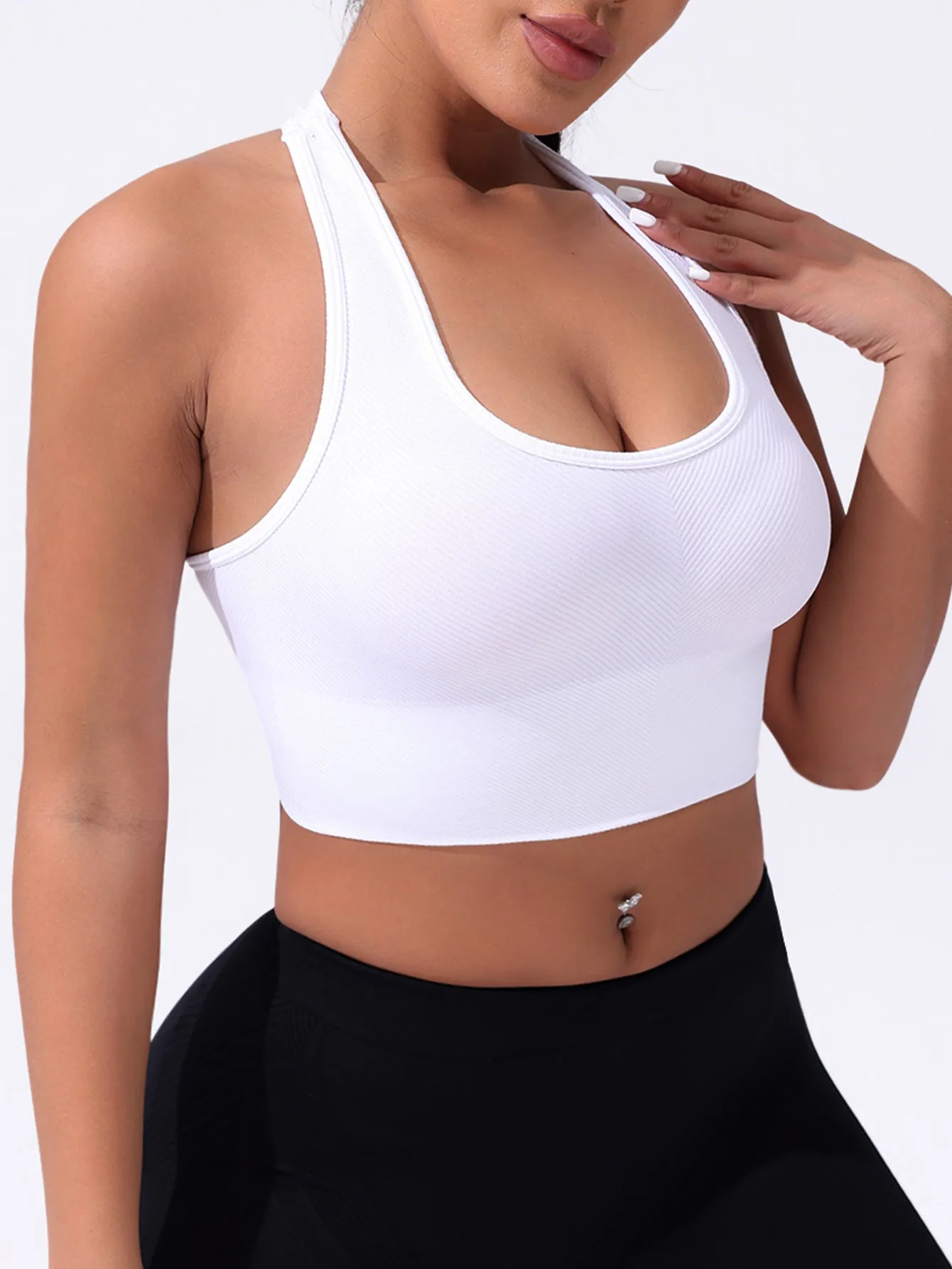 Black cross-back sports bra with quick-dry nylon fabric for running and yoga support