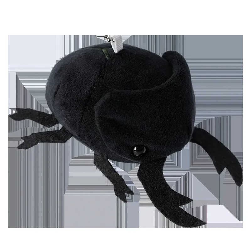 Small black plush rhinoceros beetle doll pendant with 10cm height on a white background.