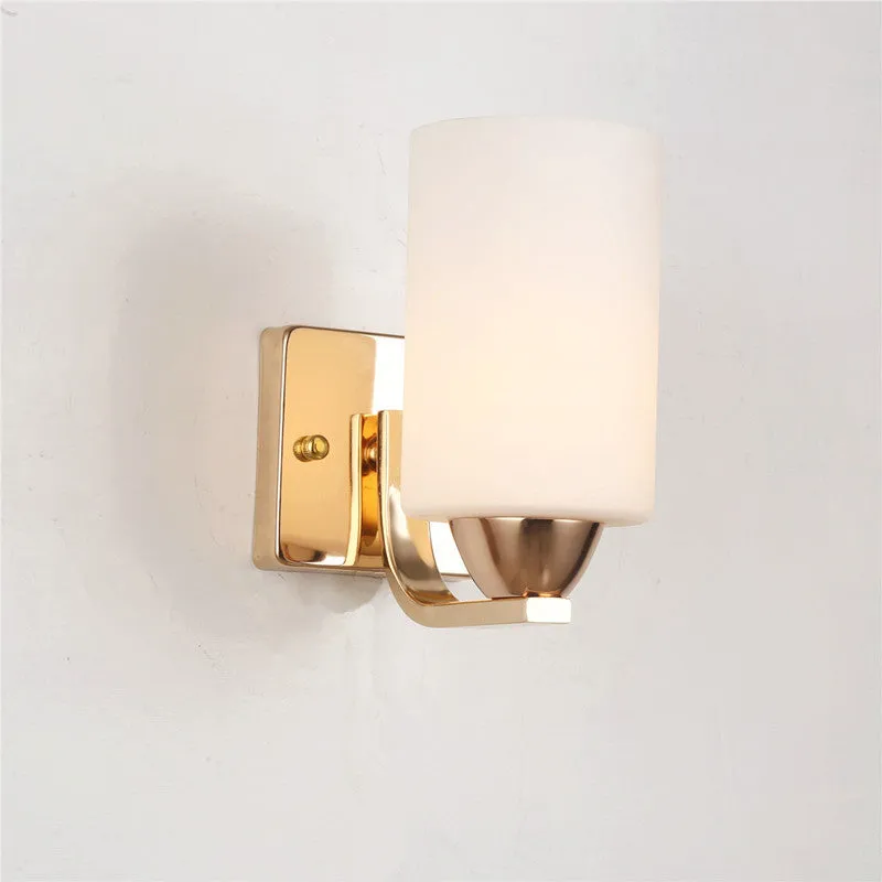 Modern chrome-finished wall lamp with a glass shade, shown in single-head and double-head configurations.
