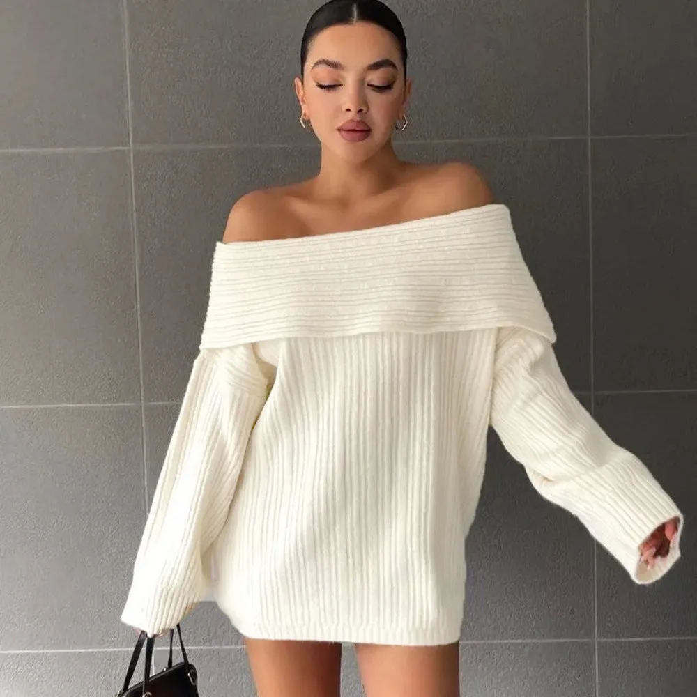 Women's loose long sleeve acrylic pullover sweater in white, shown laid flat.