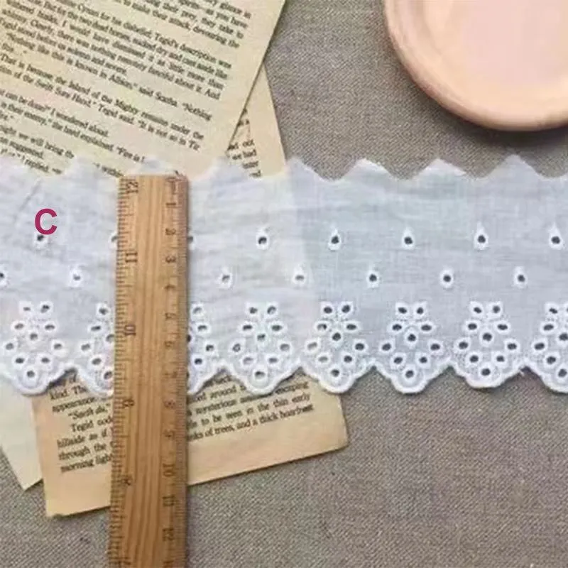 Embroidered cotton lace trim fabric in four different cutout styles for DIY clothing accessories