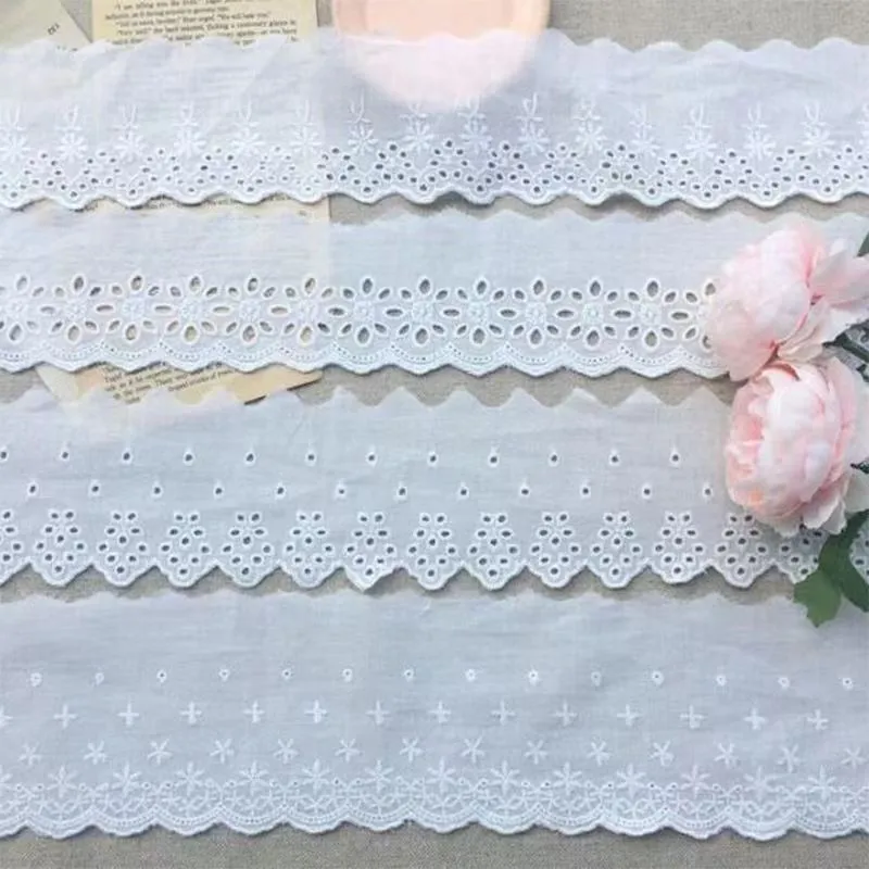 Embroidered cotton lace trim fabric in four different cutout styles for DIY clothing accessories