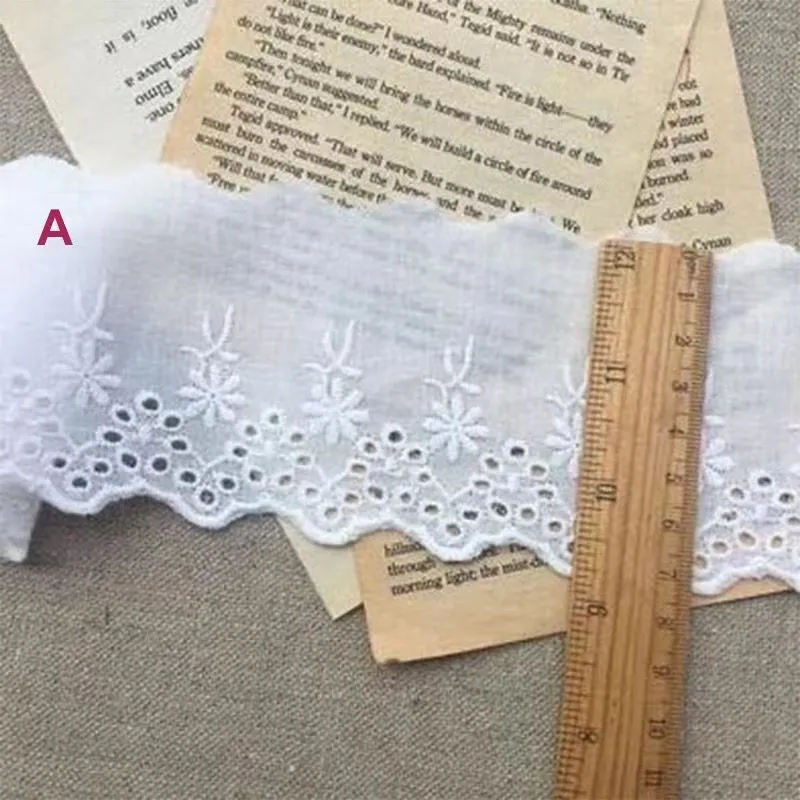 Embroidered cotton lace trim fabric in four different cutout styles for DIY clothing accessories