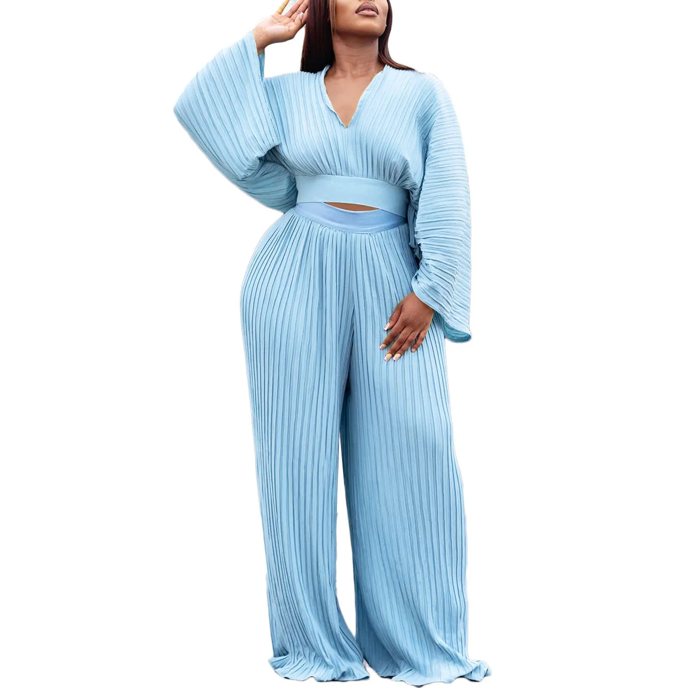 African suit two-piece set with batwing sleeve top and wide leg trousers in red or blue.