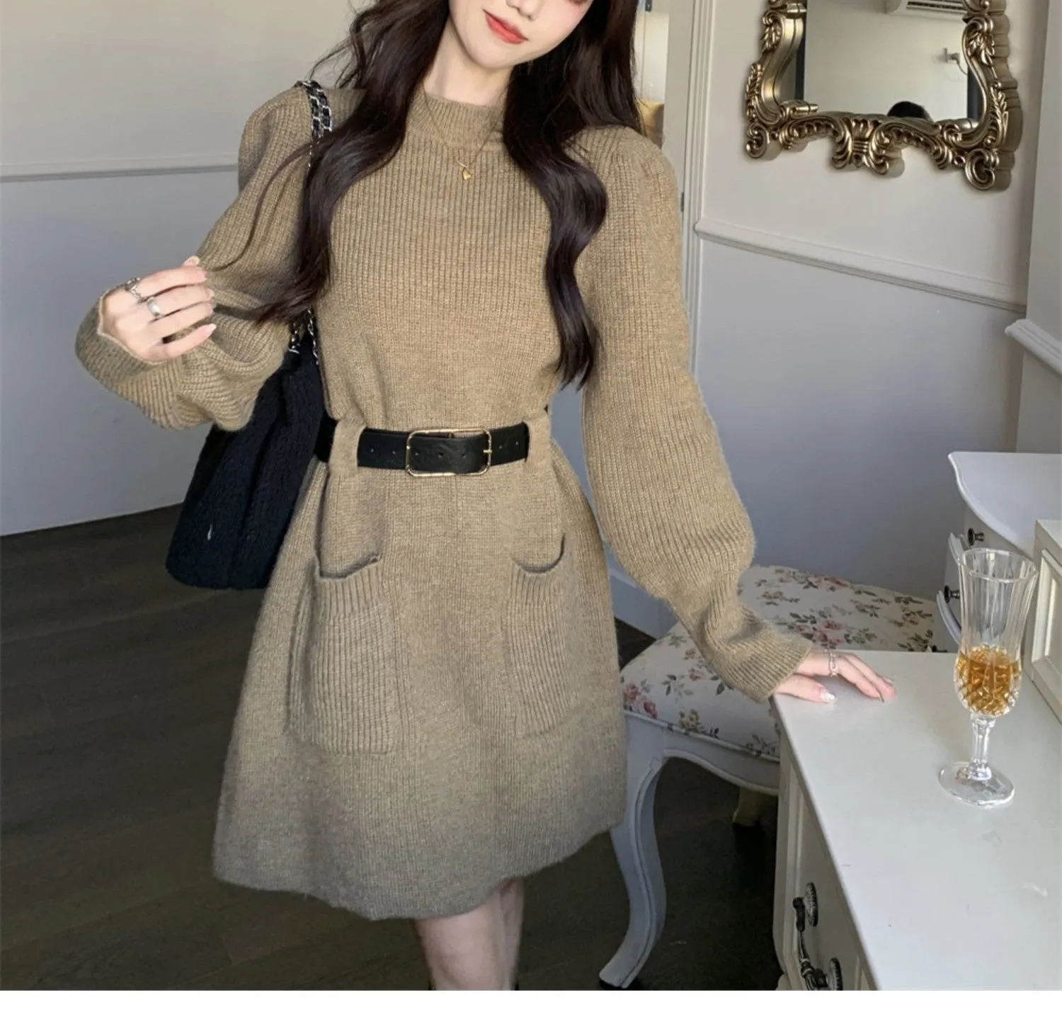 Women's loose knitted dress with long sleeves and high waist, shown in beige with black belt