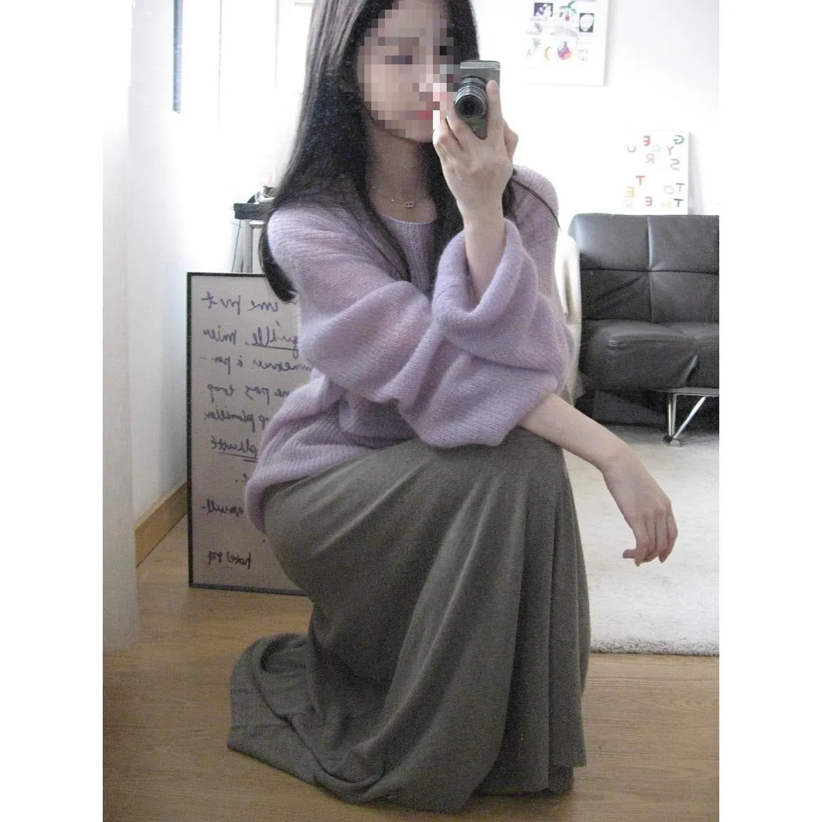 Purple sleeveless women's blouse with hollow out detail and round neck, made from ice silk fabric.