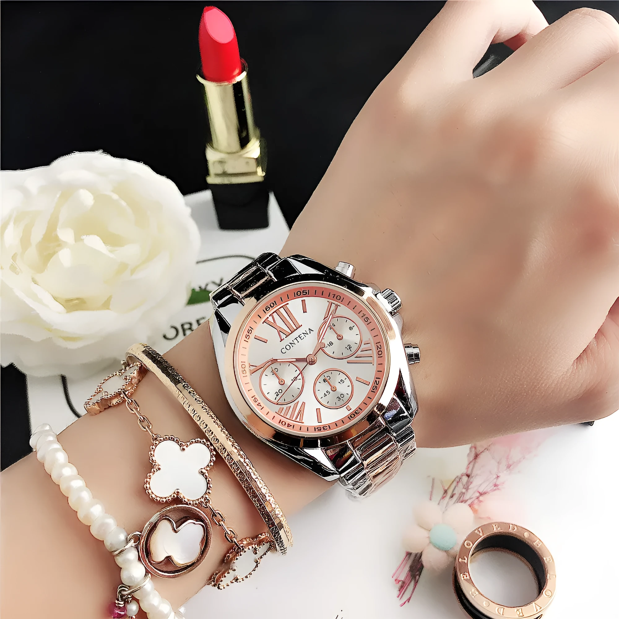 Women's silver and gold diamond quartz watch with mesh strap and analogue display