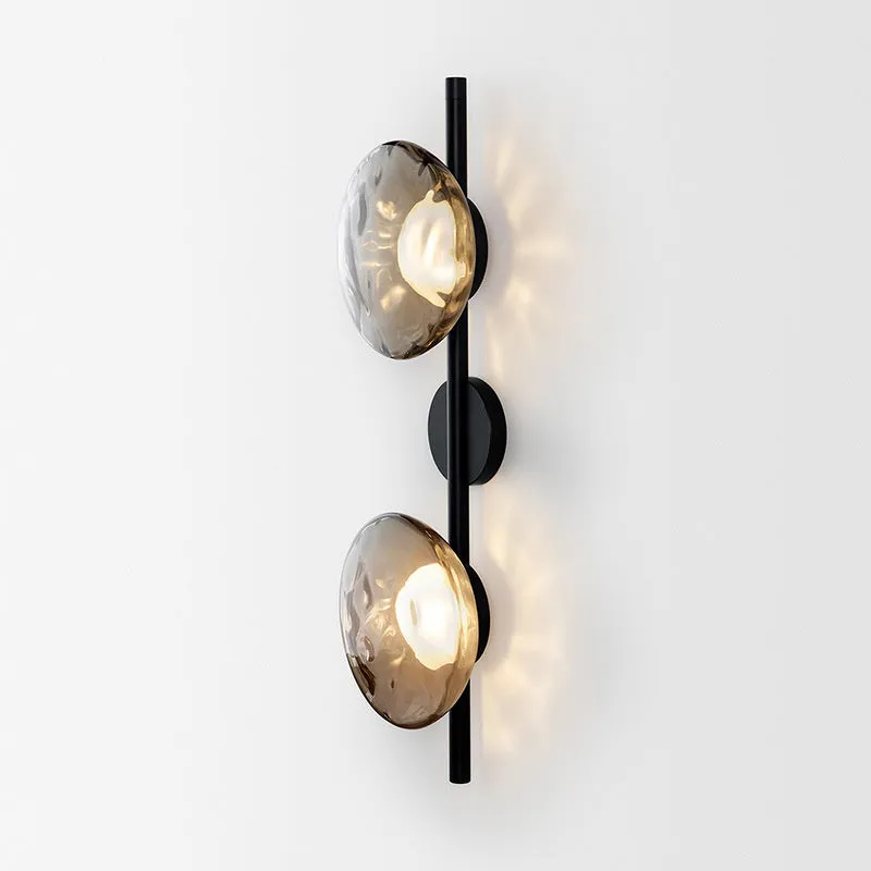 Bedside hotel wall lamp with iron construction and choice of glass shades including long brush holder style