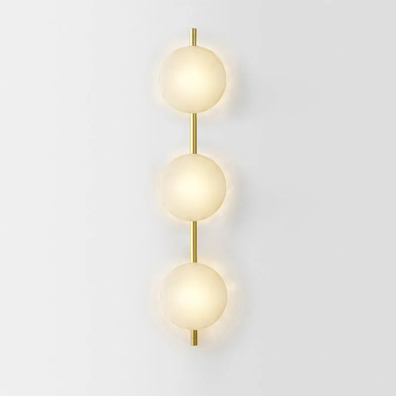 Bedside hotel wall lamp with iron construction and choice of glass shades including long brush holder style