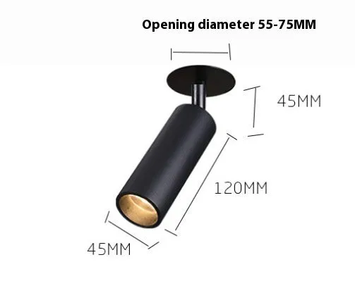 Black recessed cylinder LED spotlight installed in a ceiling track, showing adjustable head.