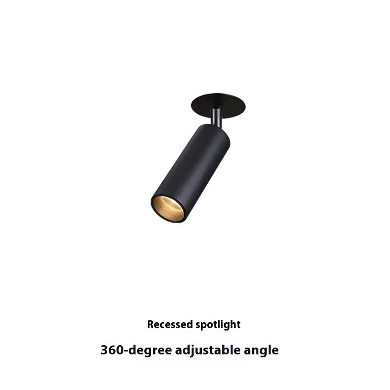 Black recessed cylinder LED spotlight installed in a ceiling track, showing adjustable head.