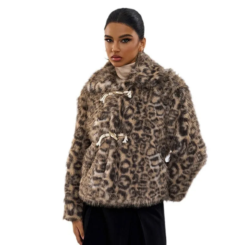Women's leopard print polyester coat with a buckle lapel closure on a hanger.