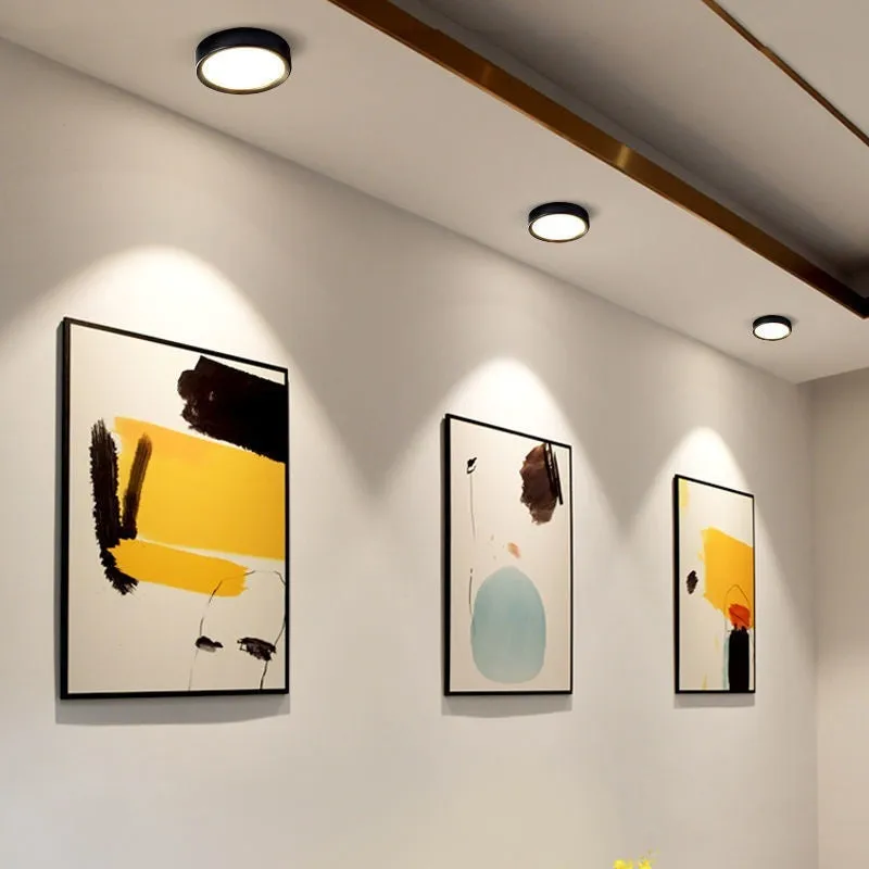 Ultra-thin surface mounted LED downlight in multiple shell colour options.
