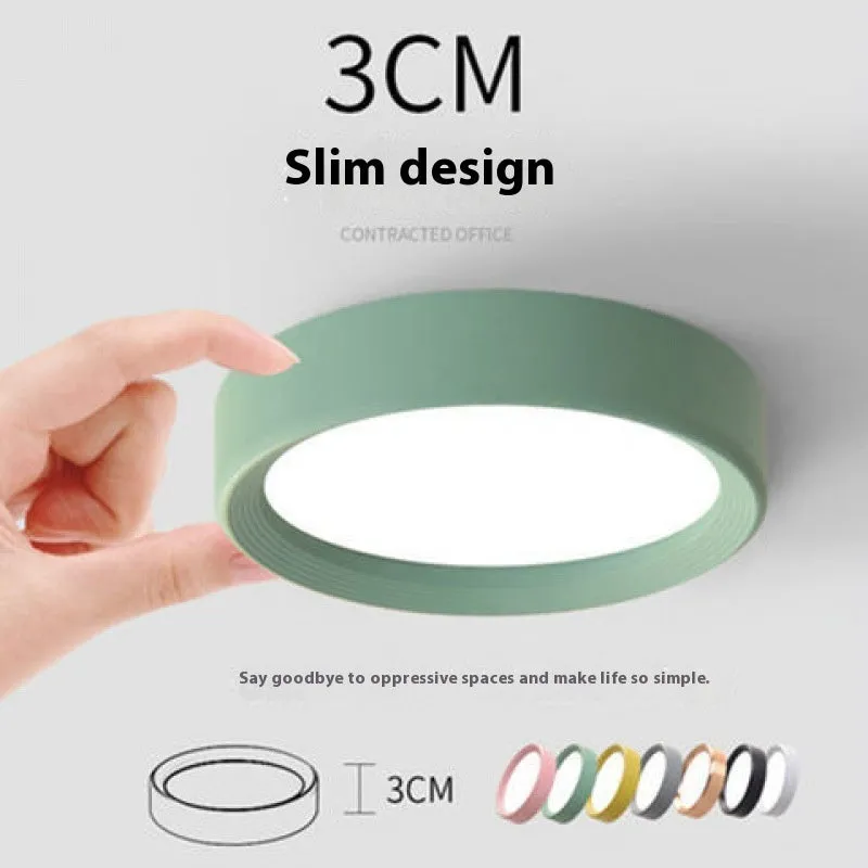 Ultra-thin surface mounted LED downlight in multiple shell colour options.