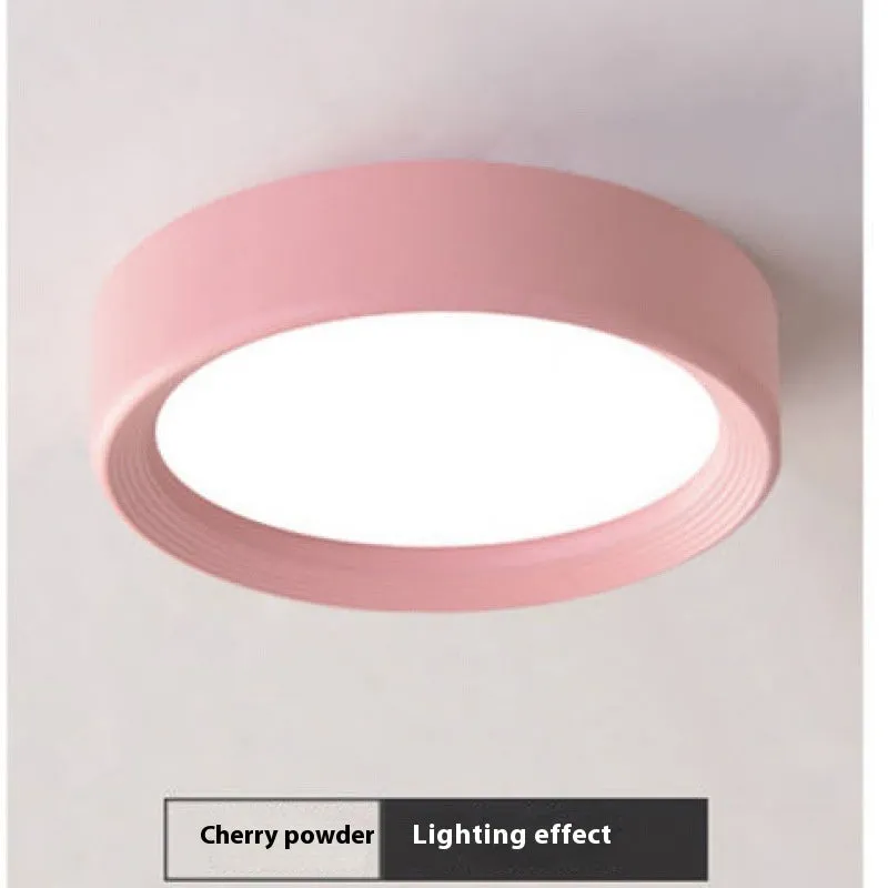 Ultra-thin surface mounted LED downlight in multiple shell colour options.