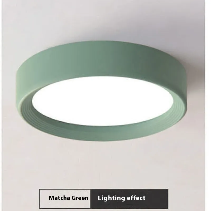 Ultra-thin surface mounted LED downlight in multiple shell colour options.