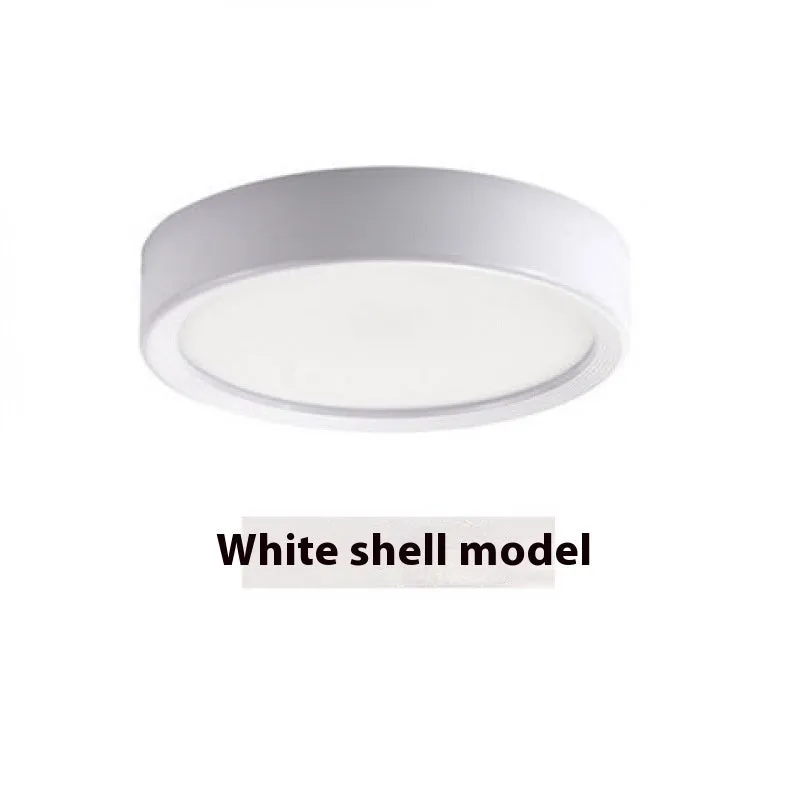 Ultra-thin surface mounted LED downlight in multiple shell colour options.