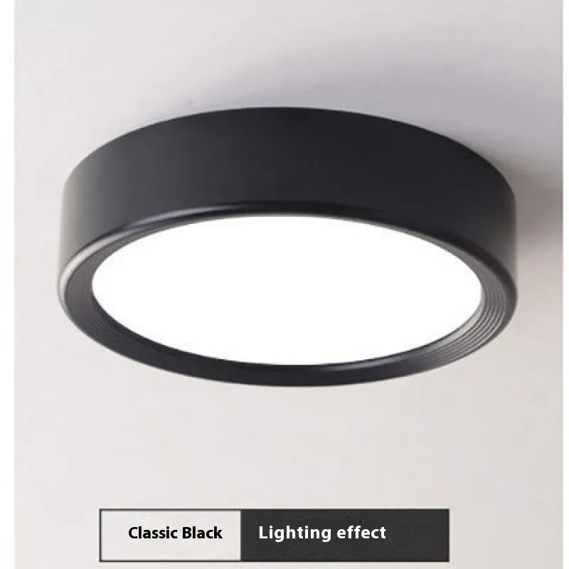 Ultra-thin surface mounted LED downlight in multiple shell colour options.