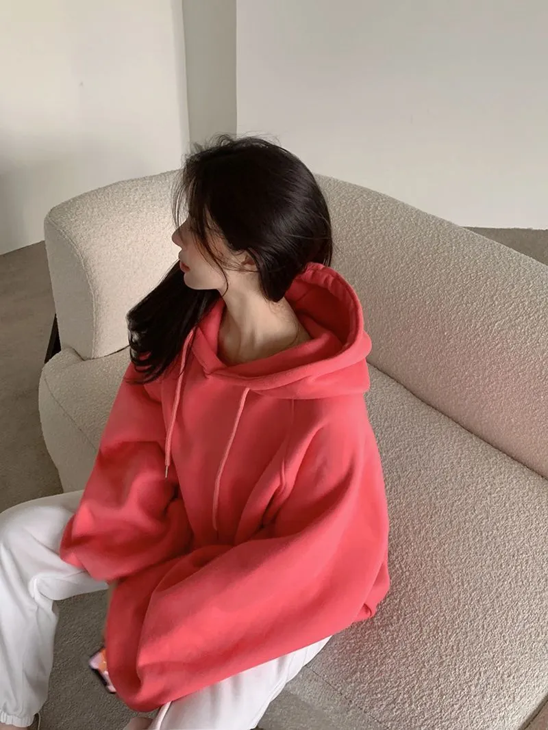 Watermelon red women's sleeveless hooded sweater made from mulberry silk fabric.