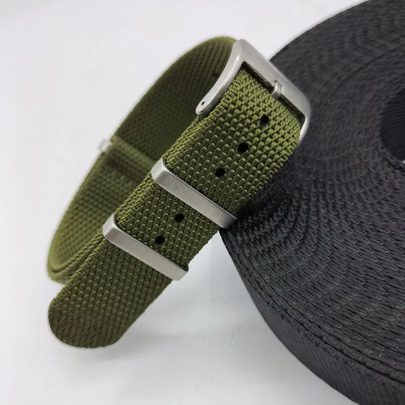 Nylon integrated watch strap in army green colour showing textile weave and buckle.