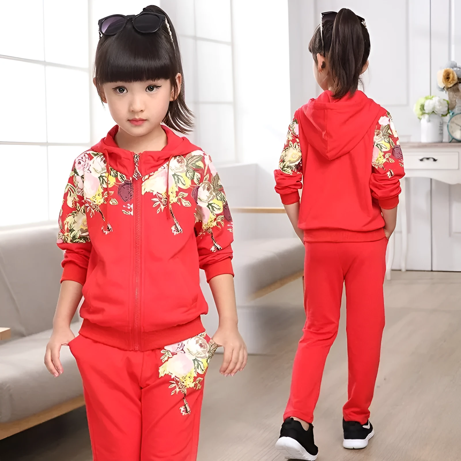 Children's pink hooded track suit set showing pullover top and joggers for age 8+