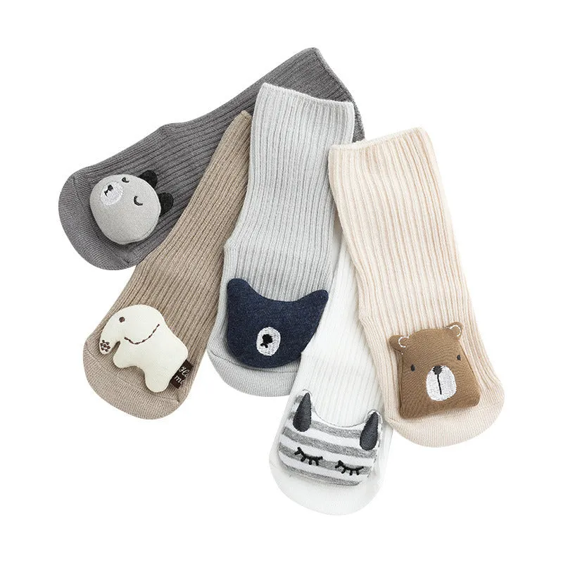 Baby socks with anti-slip dispensing glue in combed cotton, shown in multiple colours including blue bear print and pink cat.