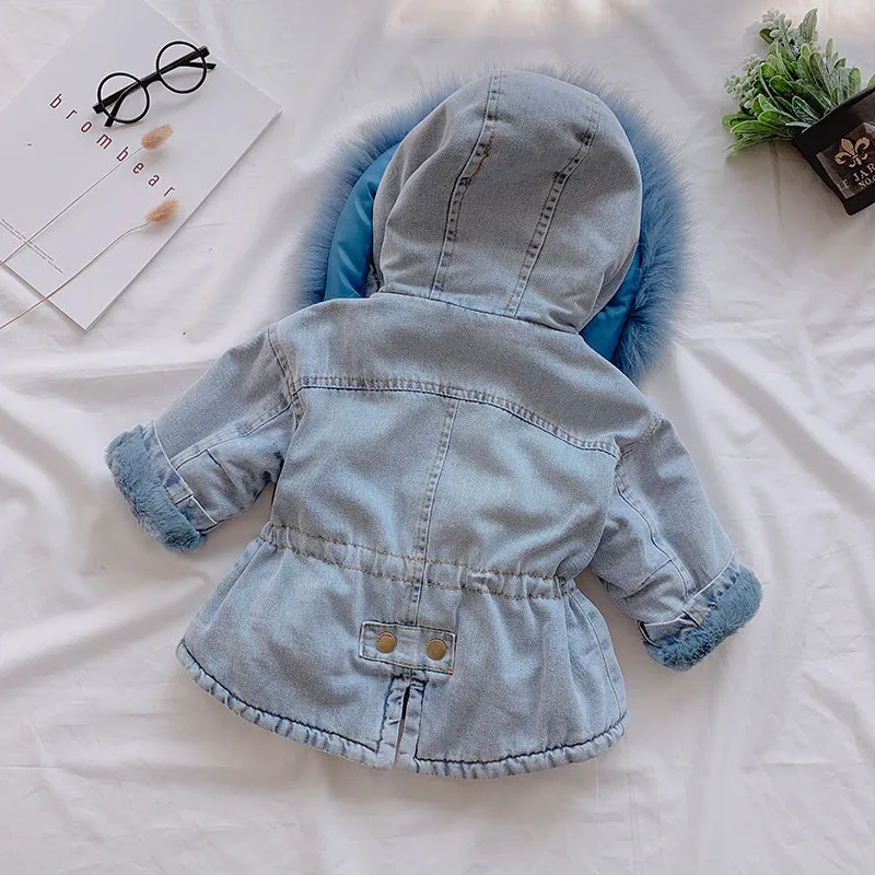 Blue denim coat for girls with a hood and plush fleece lining, shown on a hanger.