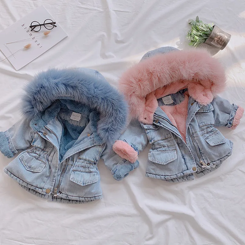 Blue denim coat for girls with a hood and plush fleece lining, shown on a hanger.