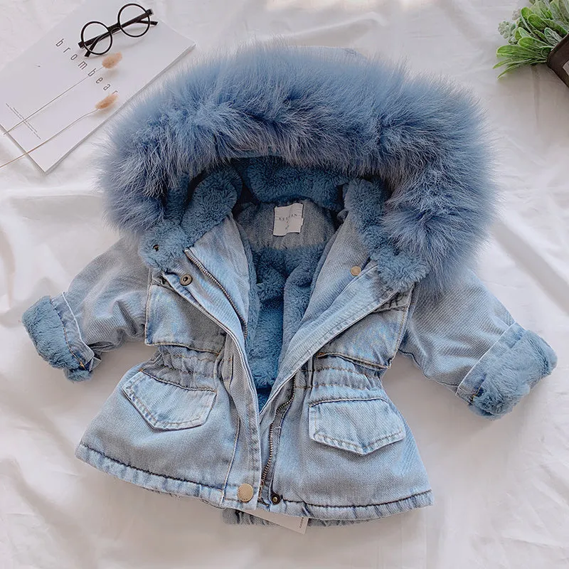 Blue denim coat for girls with a hood and plush fleece lining, shown on a hanger.