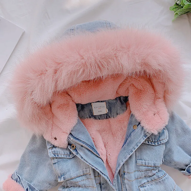 Blue denim coat for girls with a hood and plush fleece lining, shown on a hanger.