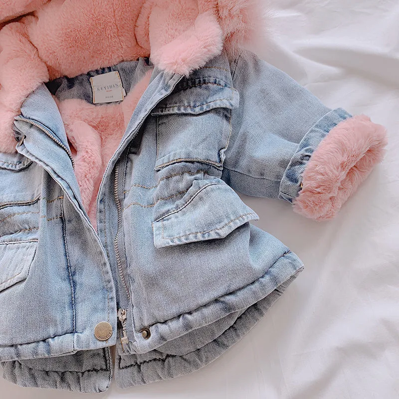 Blue denim coat for girls with a hood and plush fleece lining, shown on a hanger.