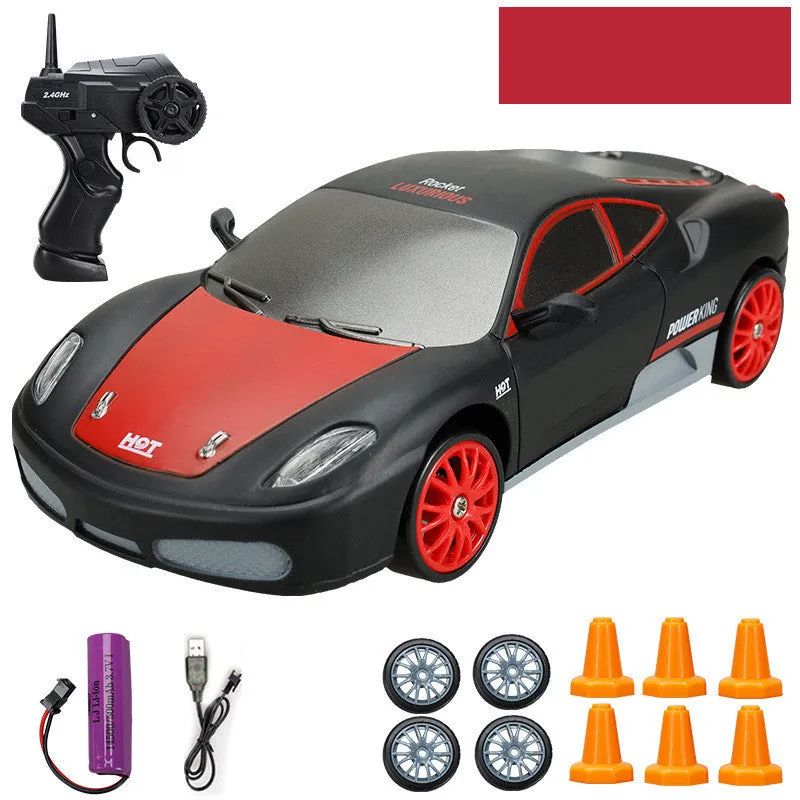 Huangbo red 4WD remote control drift car with wireless controller on a racing track