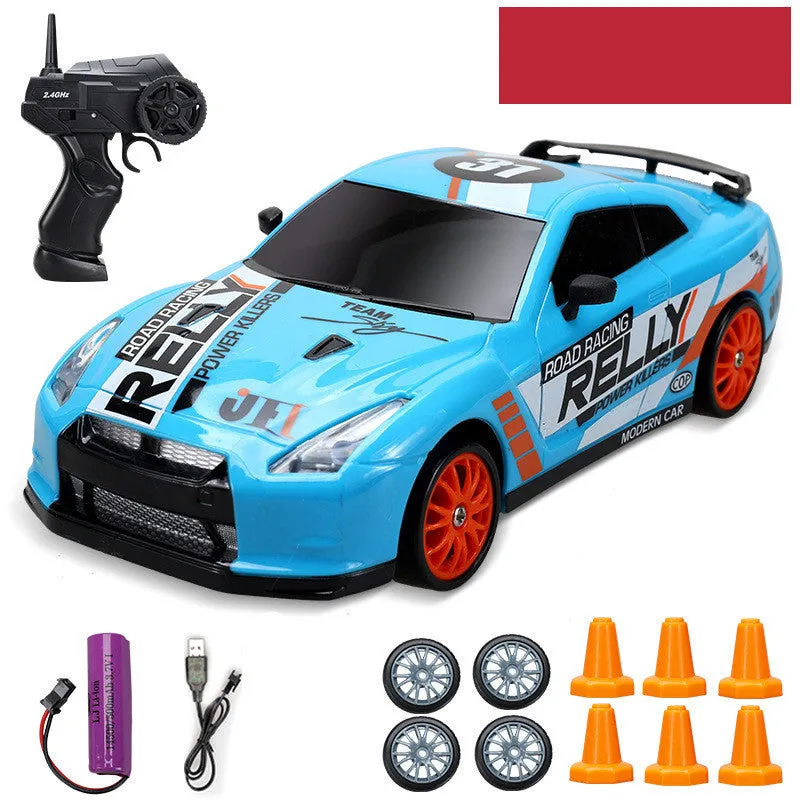 Huangbo red 4WD remote control drift car with wireless controller on a racing track