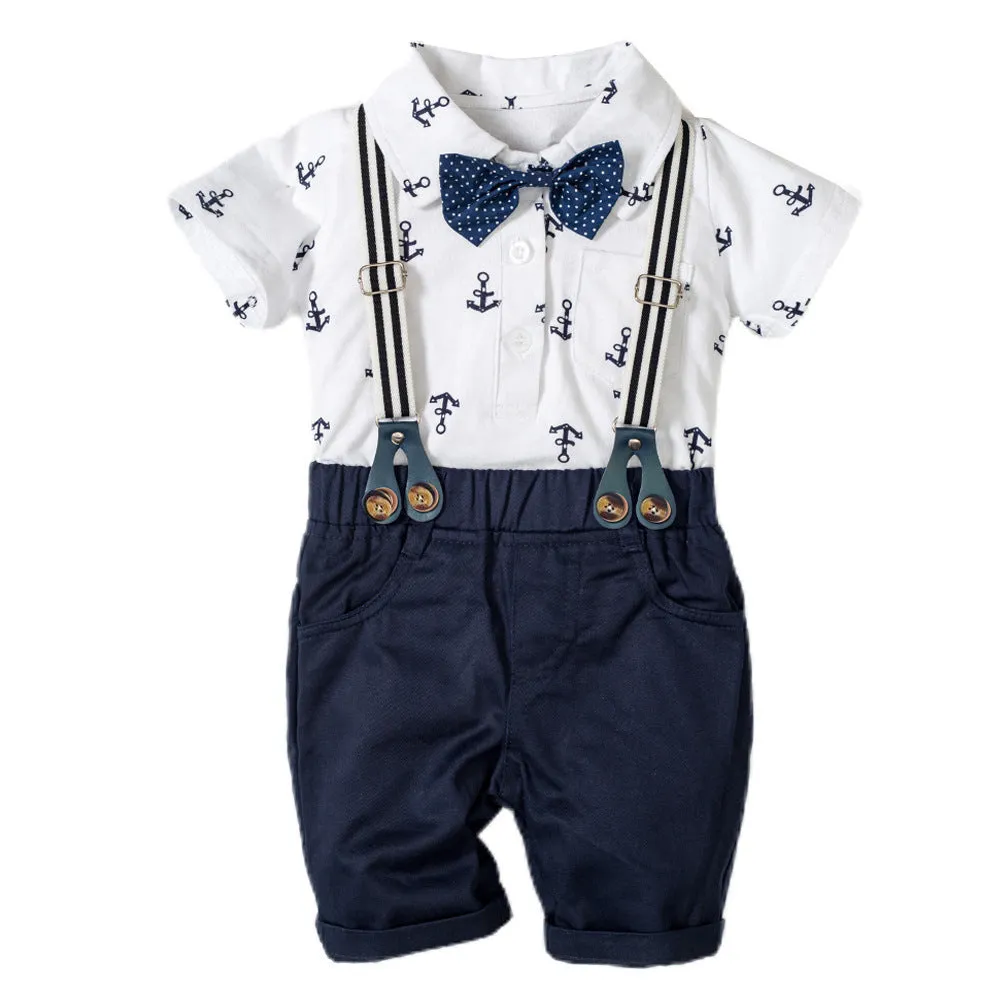 Cotton triangle romper for baby boys in blue or white with short sleeves and gentleman styling