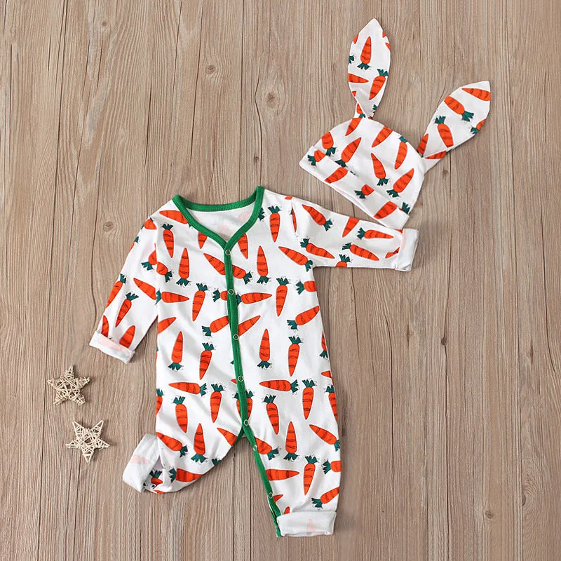 Red cotton baby romper jumpsuit for toddlers on a hanger