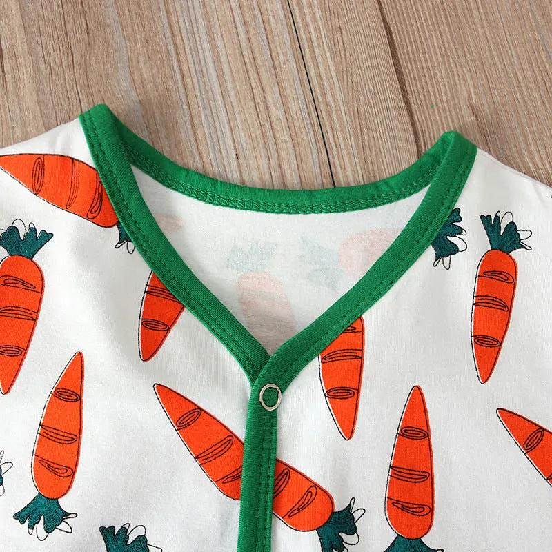 Red cotton baby romper jumpsuit for toddlers on a hanger