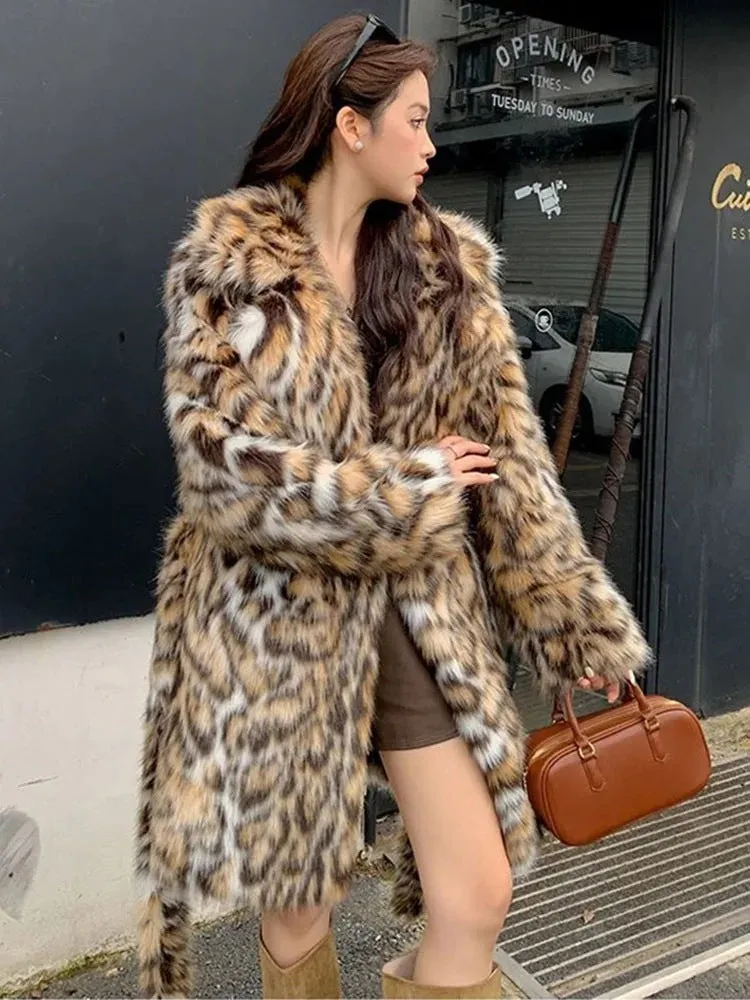 A women's long faux fur coat with a fur collar and pockets, shown in a street fashion style.