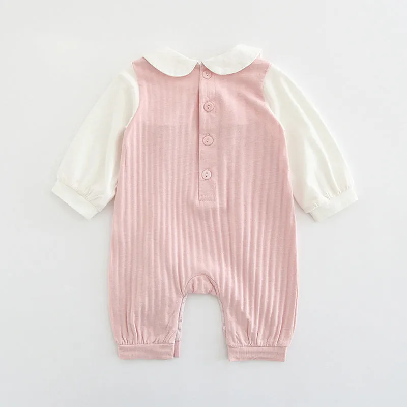 Pink cotton baby girl's long sleeve jumpsuit with single-breasted closure
