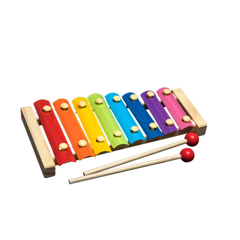 Wooden educational toys including rainbow blocks, musical instruments, and Montessori learning aids for baby development