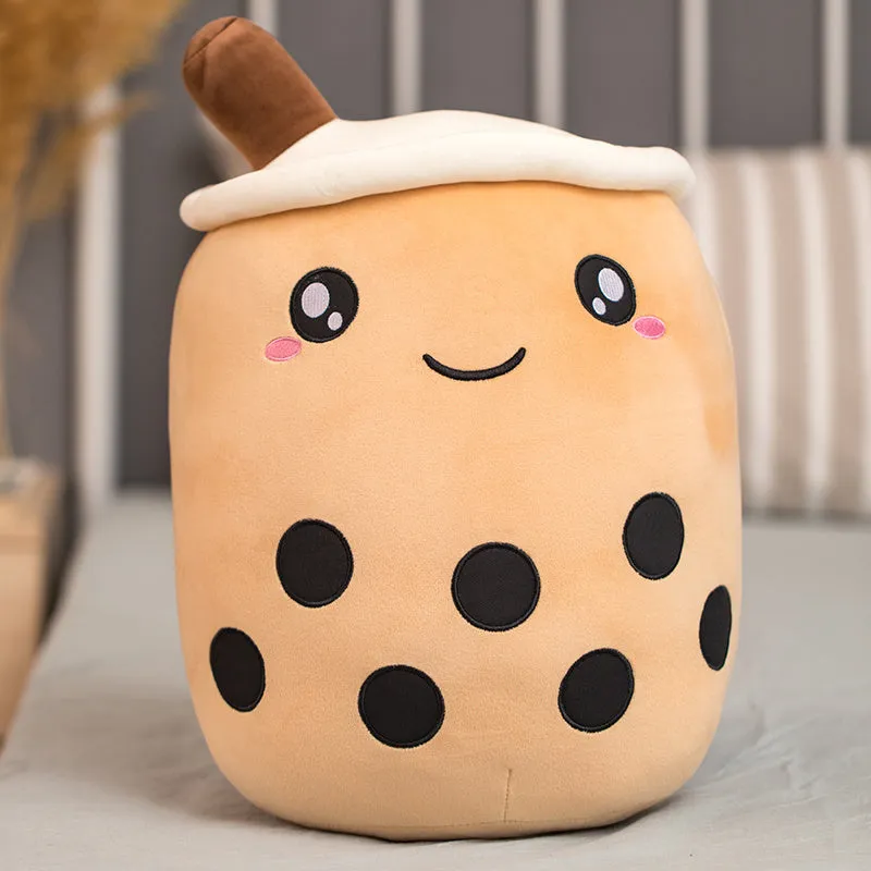 Brown boba milk tea plushie toy with fruit shape on a white background