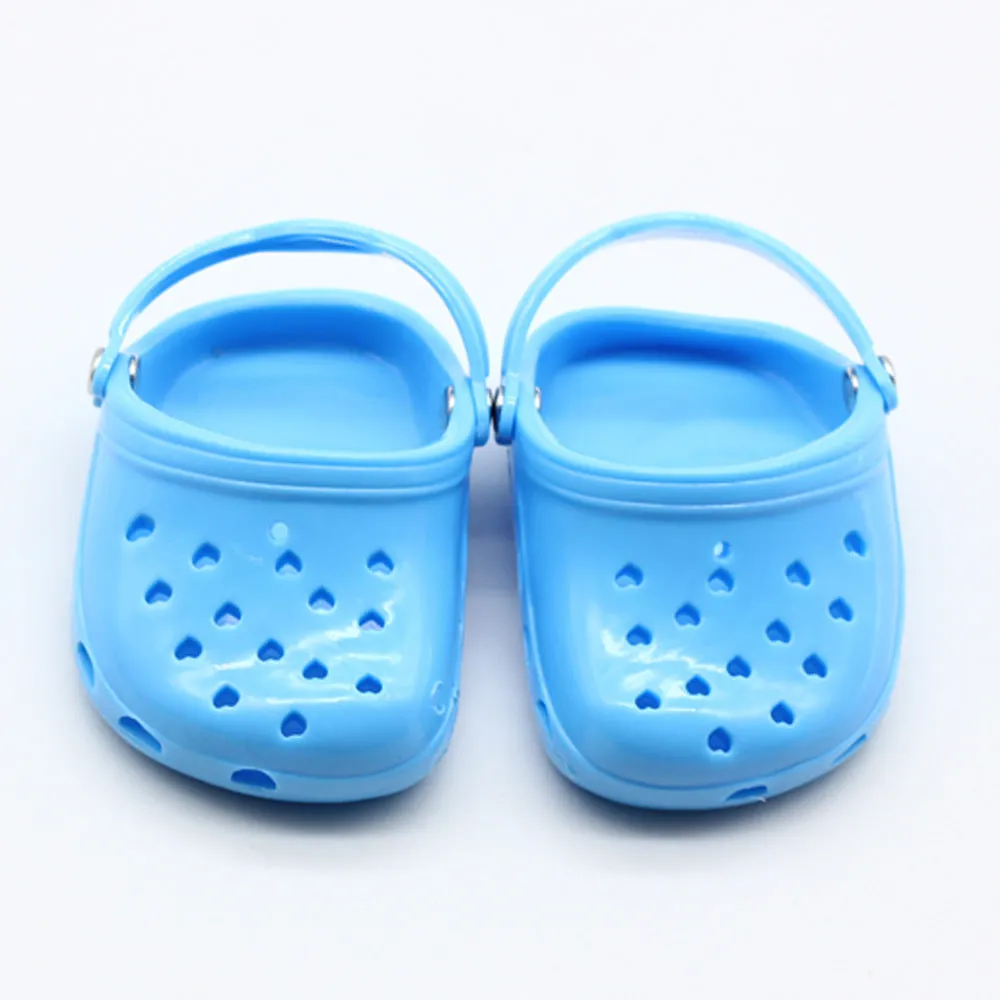 Plastic doll beach slippers accessory in blue, red, yellow, and green colours for fashion dolls