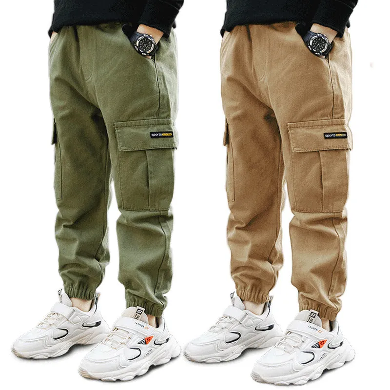Boys' casual cotton trousers in army green, shown laid flat with size label visible.