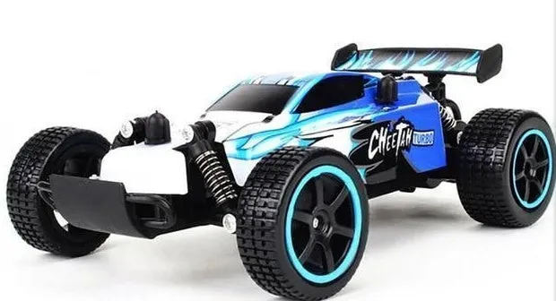 Blue 1:18 scale remote control drift car with 2.4GHz transmitter on black surface
