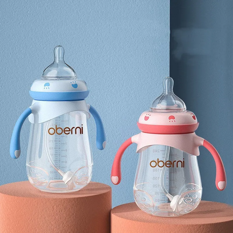 Wide caliber baby feeding bottle with anti-colic valve and handle in blue, green or red colours