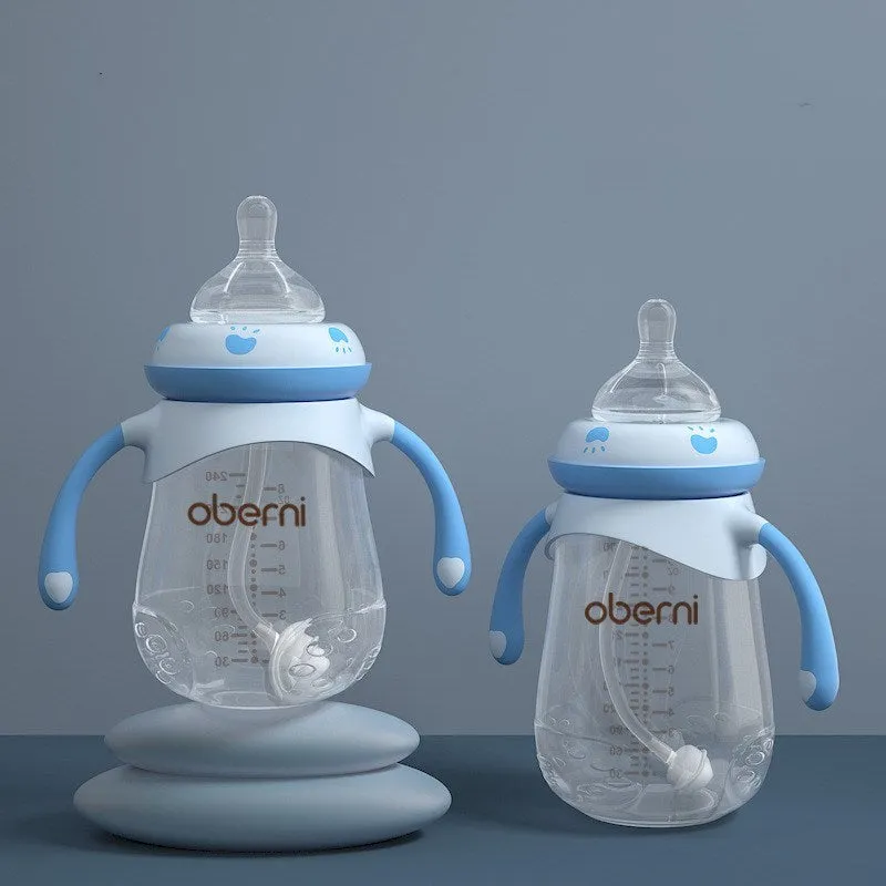Wide caliber baby feeding bottle with anti-colic valve and handle in blue, green or red colours