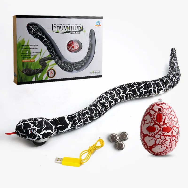 Black and grey cobra remote control snake toy with USB charging cable and batteries