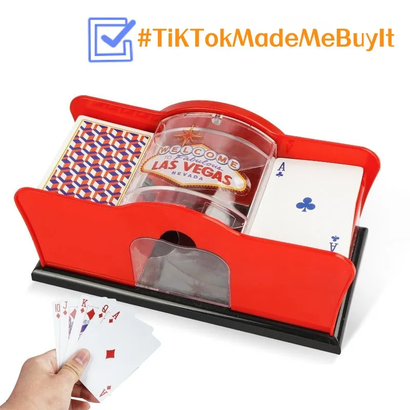 Black and red manual hand crank card shuffler machine for poker games on a table.