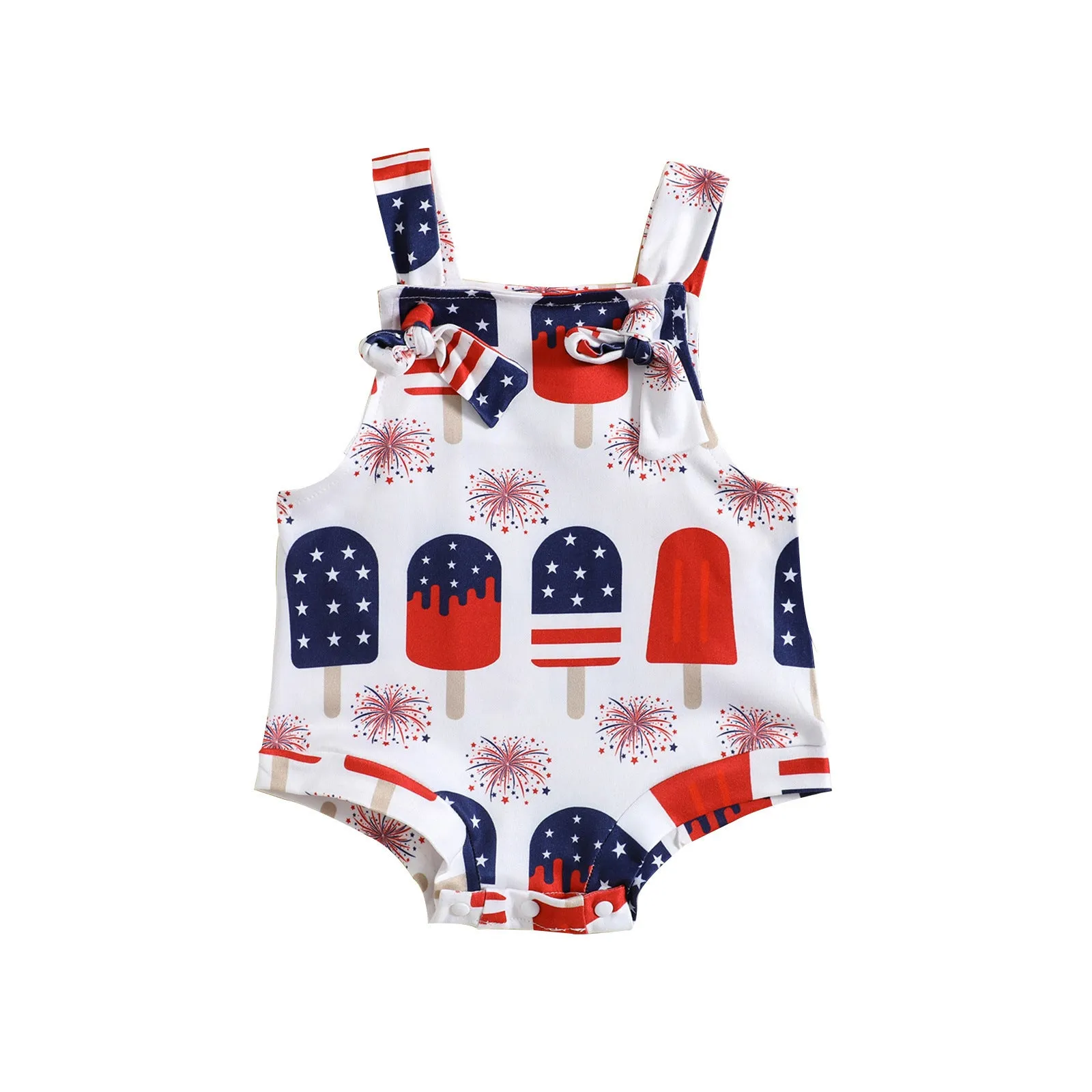 Baby girl wearing a sleeveless knotted front suspender pants jumpsuit in a printed design.