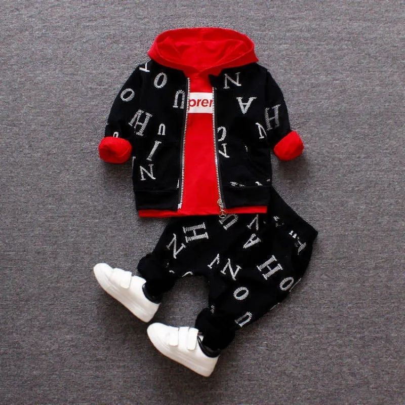 Red and white children's long sleeve two-piece clothing set made from polyester and vinylon fabric.