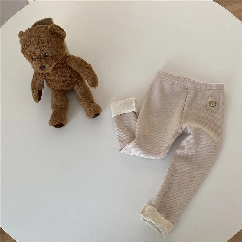 Girls' high-waist fleece-lined leggings in beige, black, brown, and grey colours on a size chart.